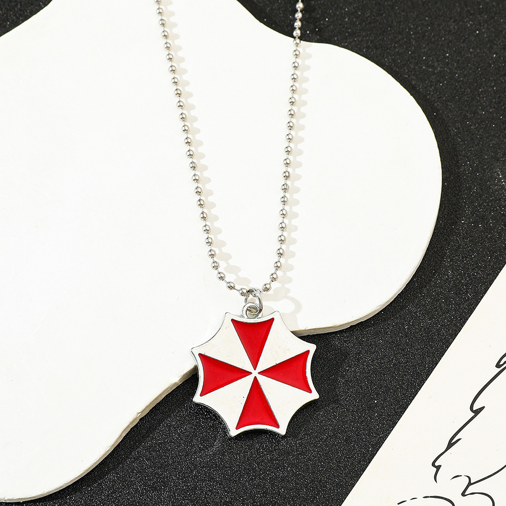 Collier pendentif parapluie ro - Vintage Fashion Nova avis et prix